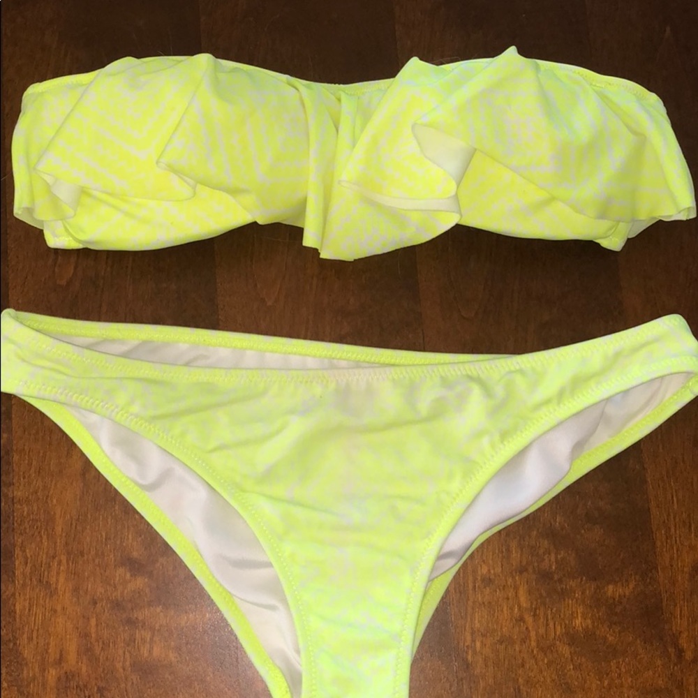 Neon yellow ruffle suit